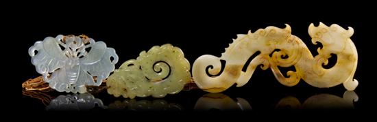 A Group of Three Jade Plaques each pierce