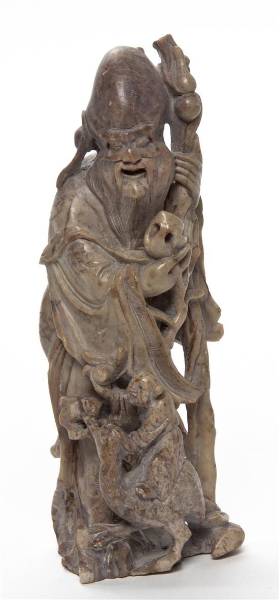 A Chinese Carved Soapstone Figure