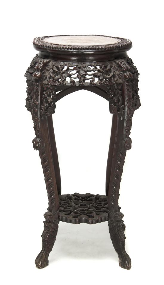 A Chinese Carved Hardwood Stand