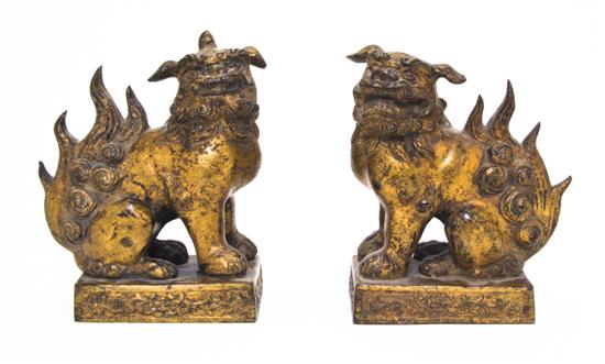A Pair of Gilt Bronze Fu Dogs the