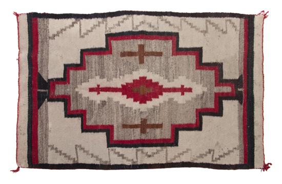 A Navajo Blanket having a center medallion