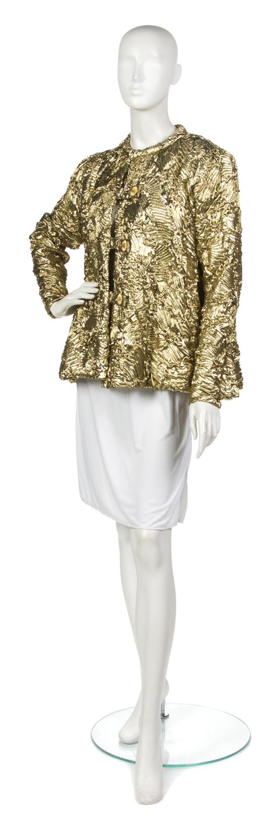 * A Pauline Trigere Gold Pleated