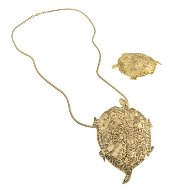 * A Pauline Trigere Goldtone Turtle