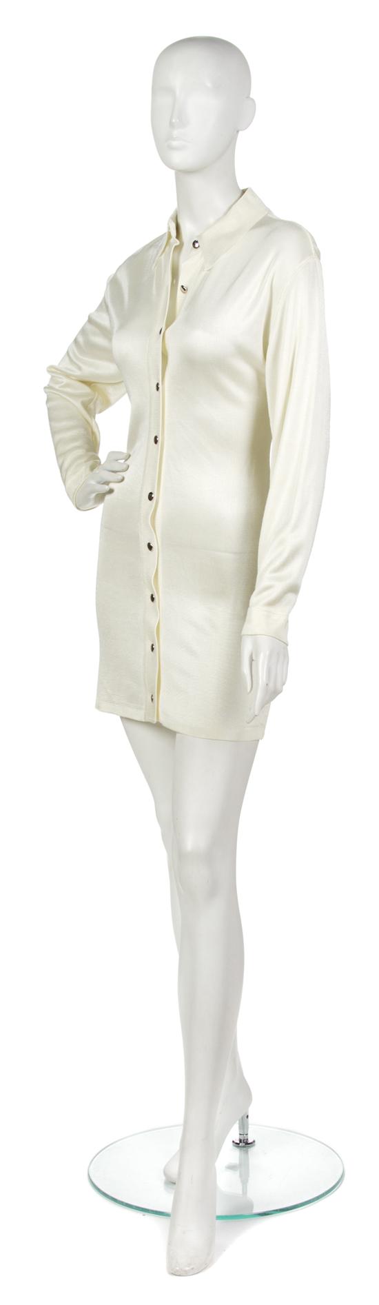 An Alaia Cream Knit Shirt Dress.