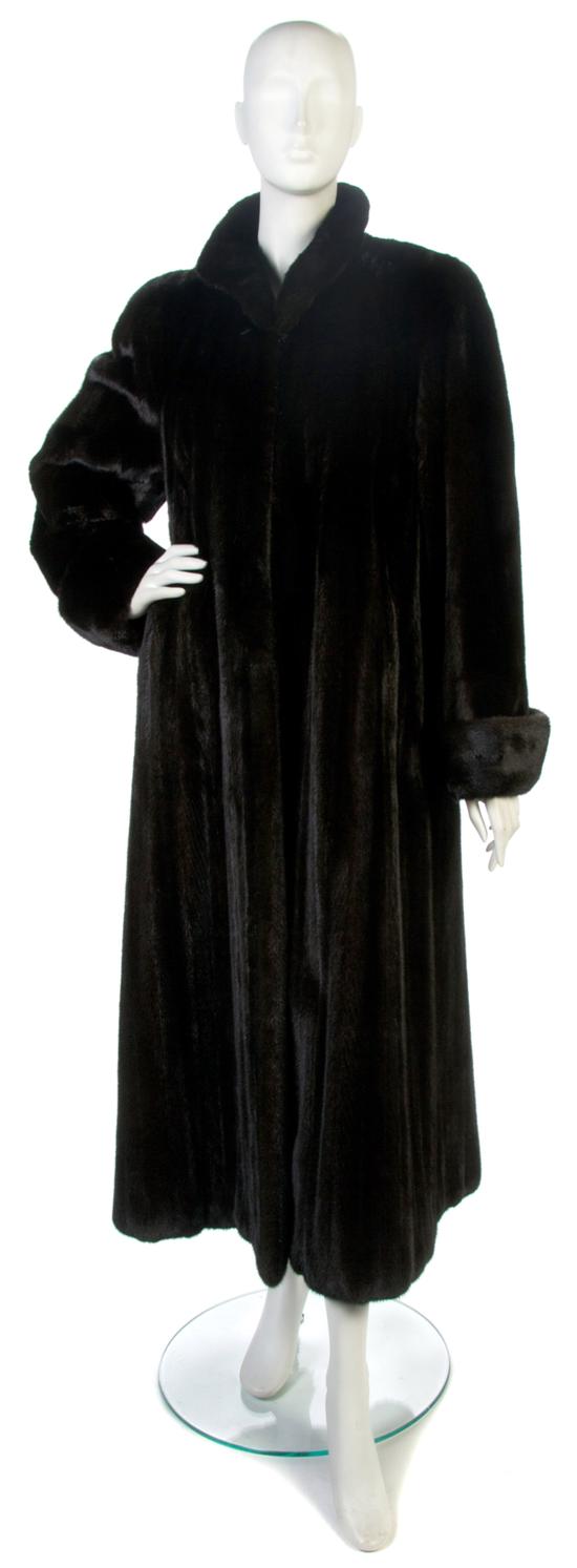A Brown Mink Coat. Labeled: Neiman Marcus.