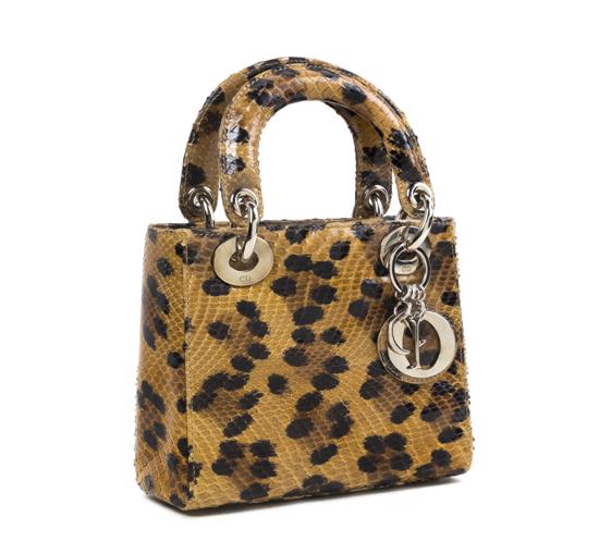 A Christian Dior Python Bag in a leopard