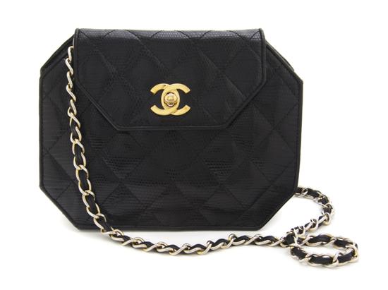A Chanel Black Quilted Purse logo
