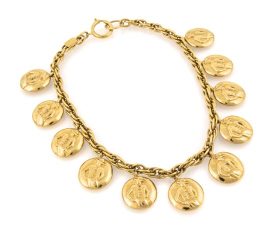 A Chanel Goldtone Charm Necklace 11