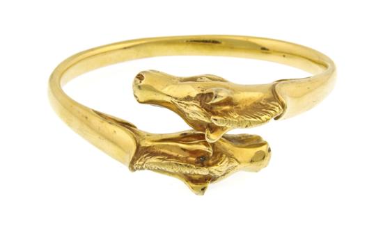 An Hermes Goldtone Horse Head Bracelet 155c17