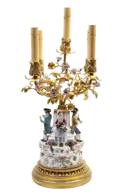 A French Gilt Bronze and Porcelain
