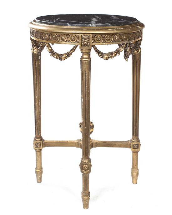 A Louis XVI Style Giltwood Gueridon