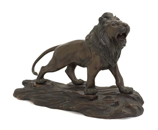 A Japanese Bronze Statue of a Lion 1535be