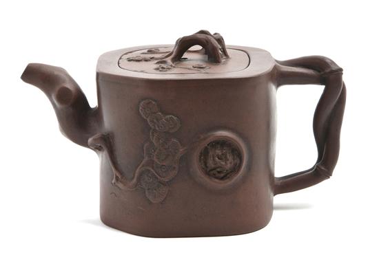 A Chinese Yixing Teapot having a branch