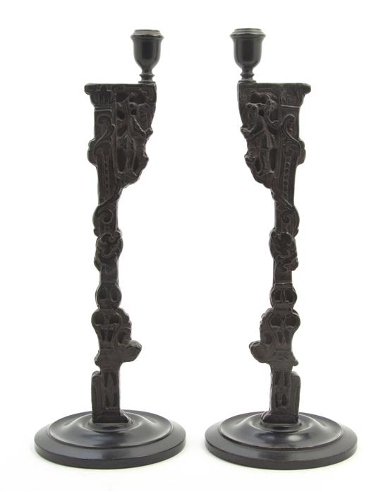 A Pair of Chinoiserie Carved Ebonized