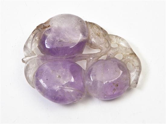  A Chinese Amethyst Toggle depicting 1535f2