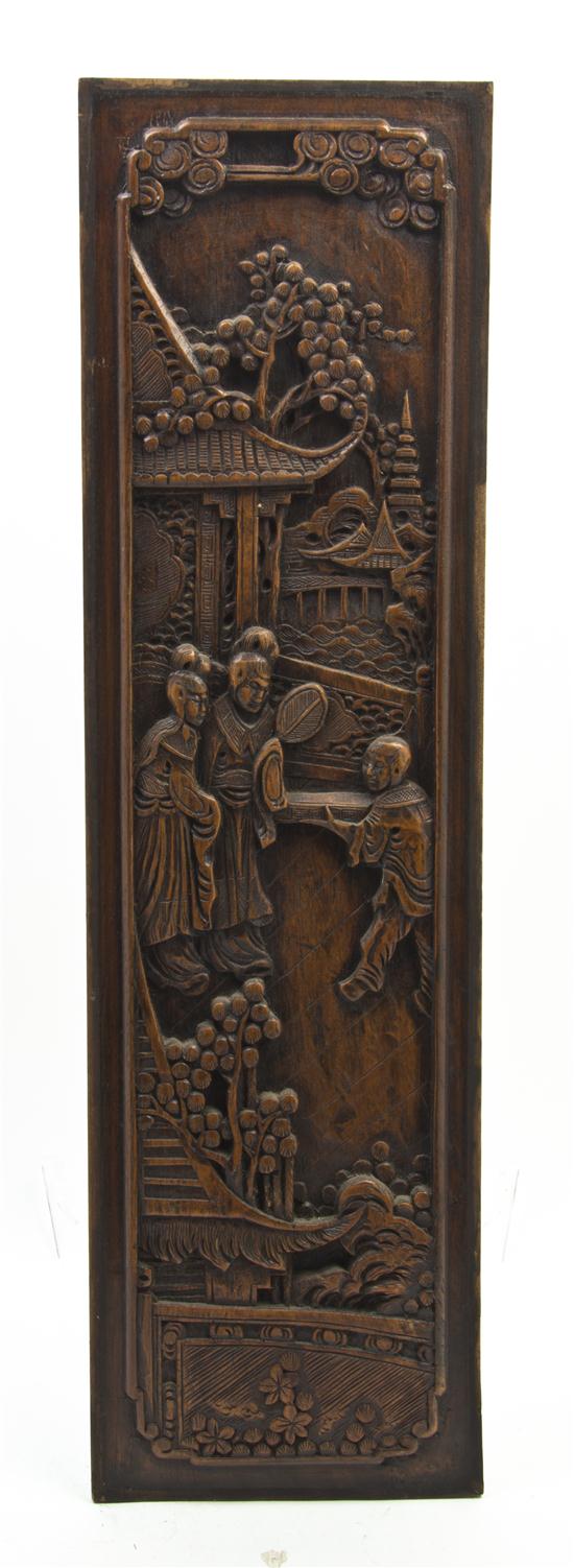 *A Chinese Carved Hardwood Panel