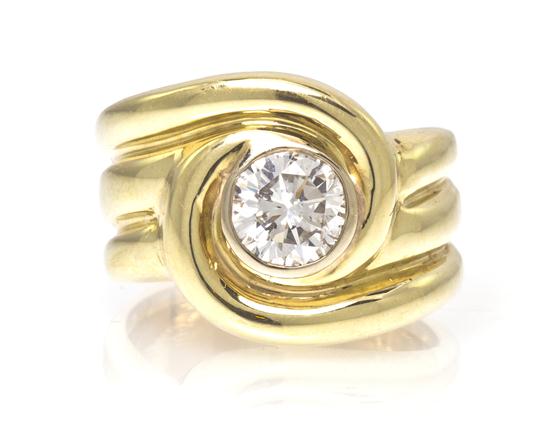 A 14 Karat Yellow Gold and Diamond