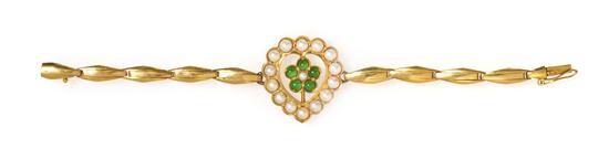 An 18 Karat Yellow Gold Jade and