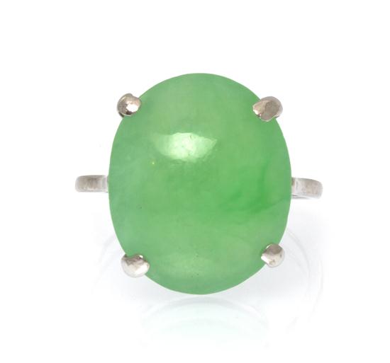 A Jade Double Cabochon Ring containing 15373e