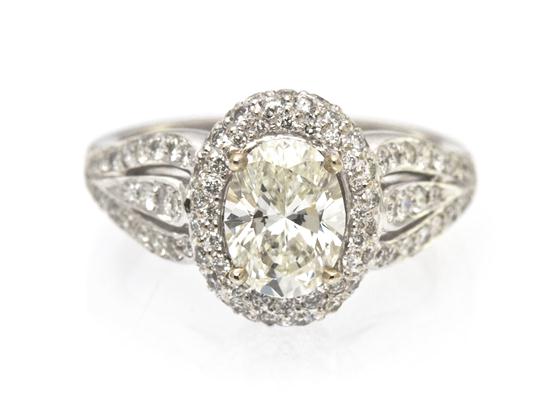 A 14 Karat White Gold and Diamond Ring