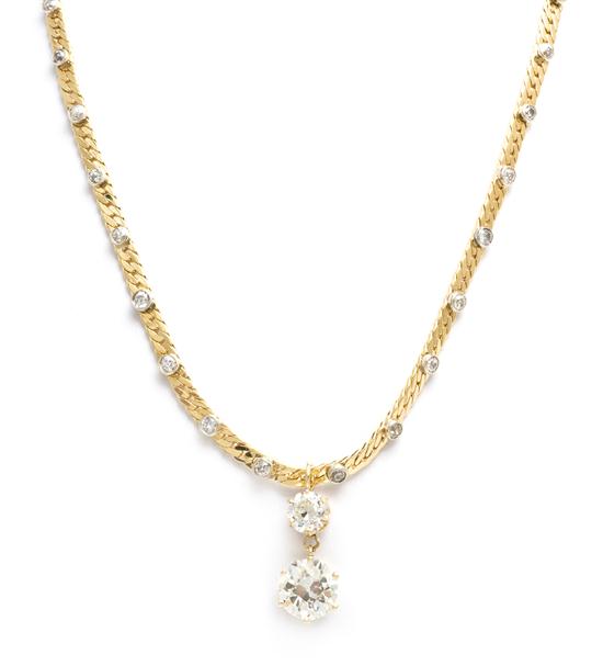 An 18 Karat Yellow Gold and Diamond 15378f