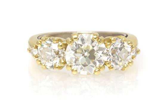 An 18 Karat Yellow Gold and Diamond 15379e