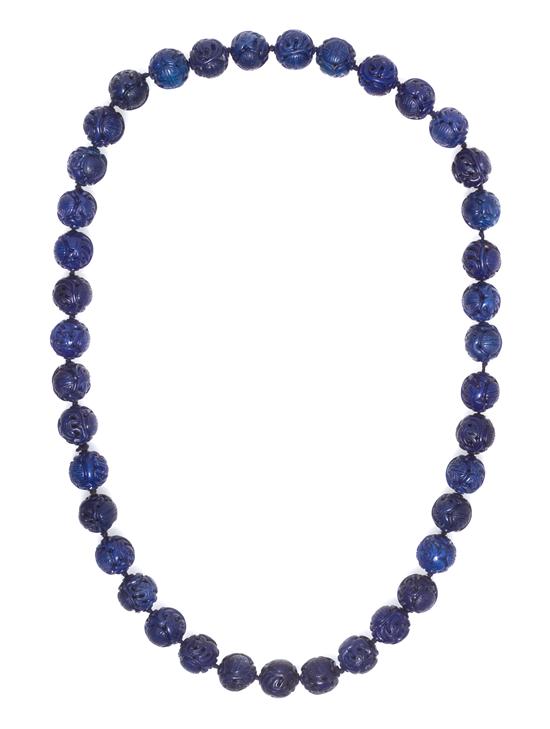 *A Single Strand Carved Lapis Lazuli