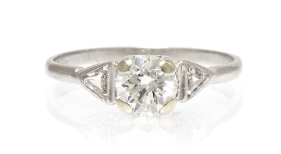 A Platinum and Diamond Ring containing