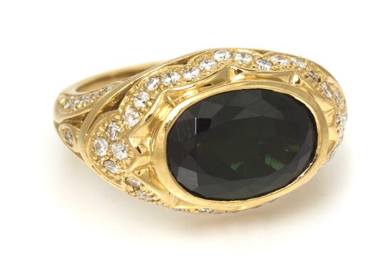 An 18 Karat Yellow Gold Green Tourmaline 15380c