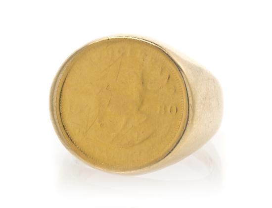 A 14 Karat Yellow Gold Coin Ring.