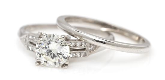 A Platinum and Diamond Ring containing