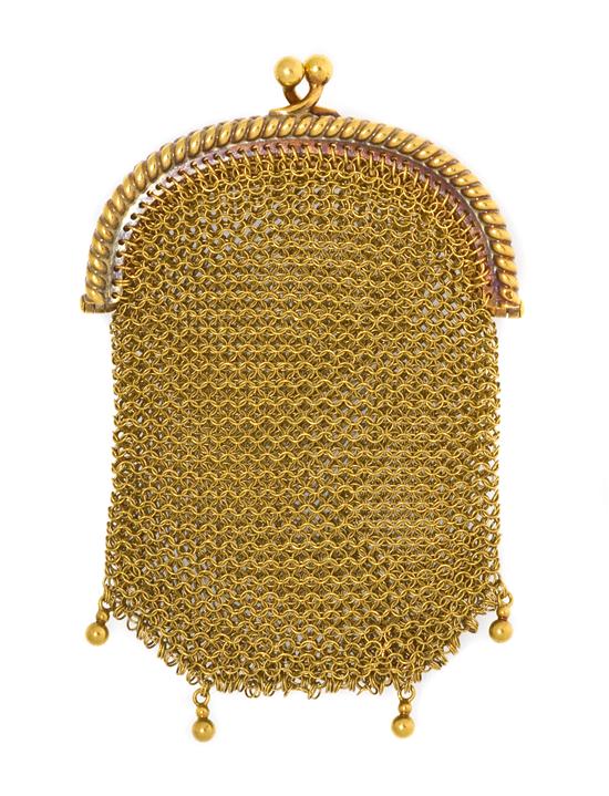  An 18 Karat Yellow Gold Mesh Coin 153846