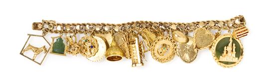 *A 14 Karat Yellow Gold Charm Bracelet