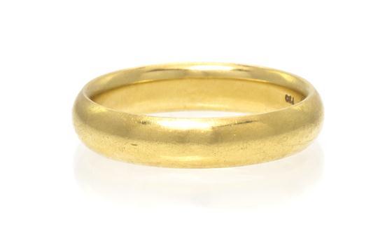 An 18 Karat Yellow Gold Wedding Band