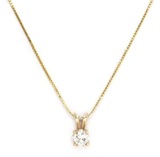 A 14 Karat Yellow Gold and Diamond 153886