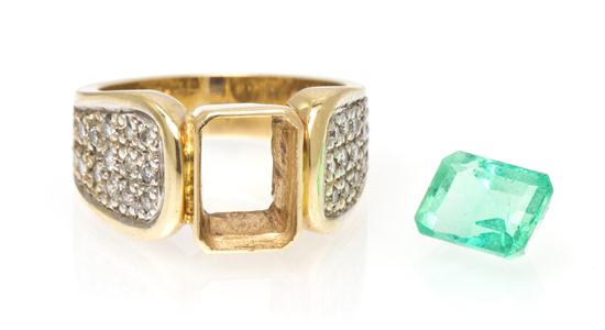 A 14 Karat Yellow Gold Emerald