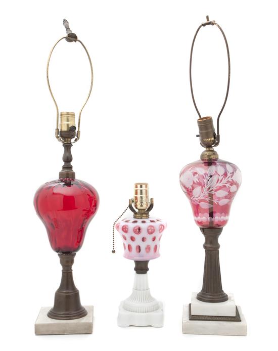 Three Cranberry Glass Lamps two 1539f1