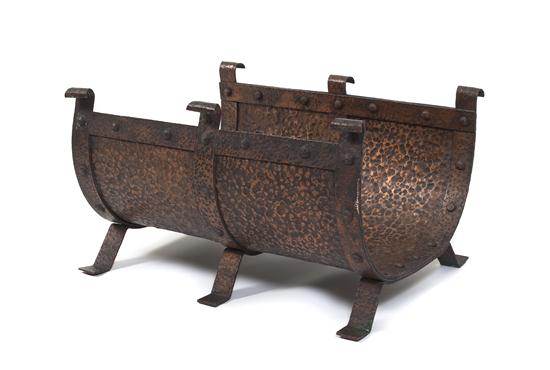 A Hammered Copper Log Rack raised