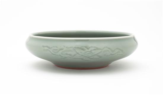 A Celadon Glazed Porcelain Bowl of squat