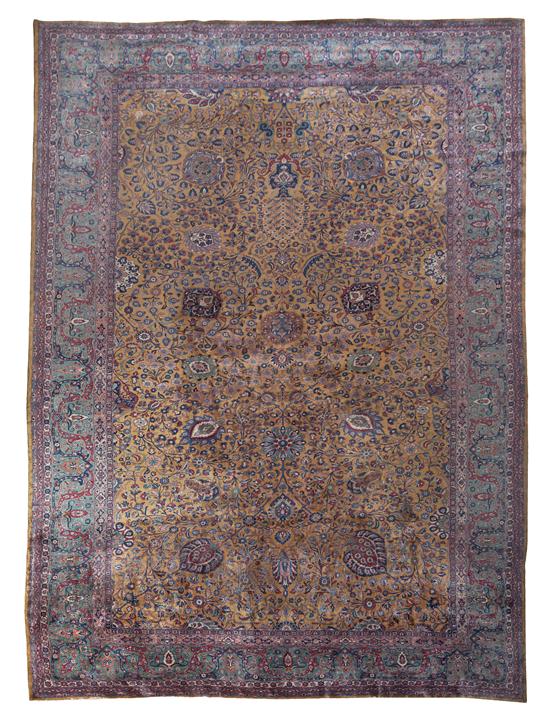 A Tabriz Wool Rug having floral 153b9e