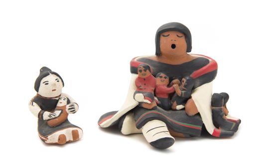 A Cochiti Storyteller together with