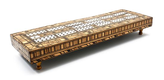 A Wood and Ivory Inlaid Cribbage Board