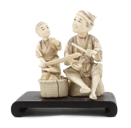 A Japanese Ivory Figure depicting a