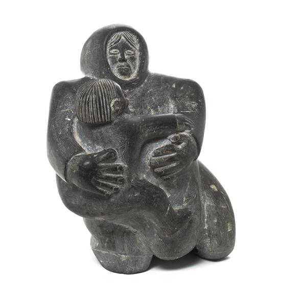 A Stone Inuit Sculpture depicting 153d47