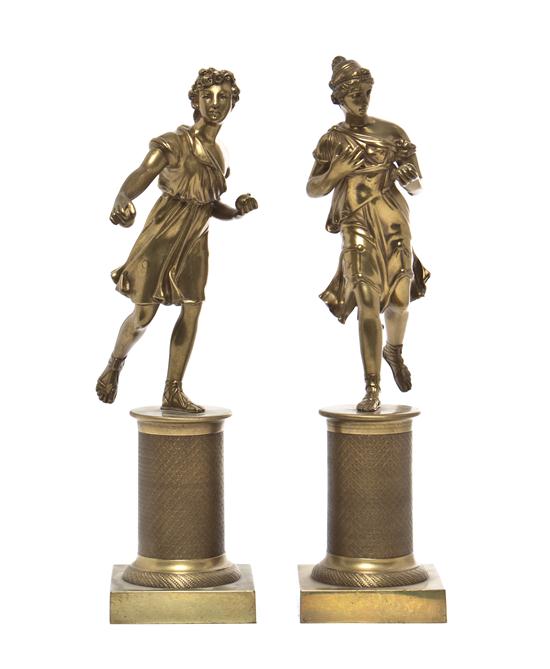 A Pair of Bronze Figures depicting a