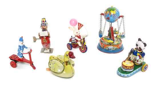 Five Pressed Tin Mechanical Toys