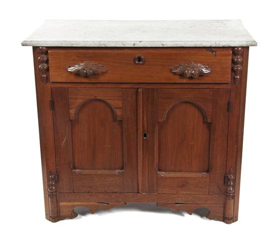 * A Victorian Walnut Washstand