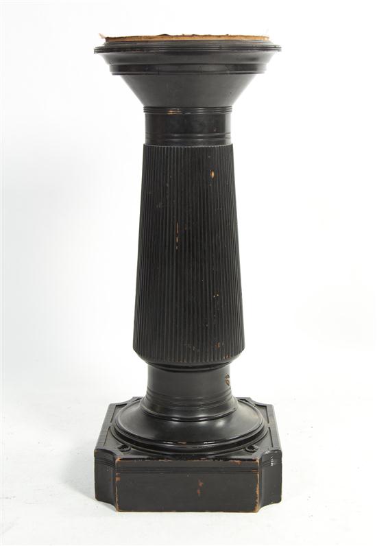 An Ebonized Wood Pedestal the circular