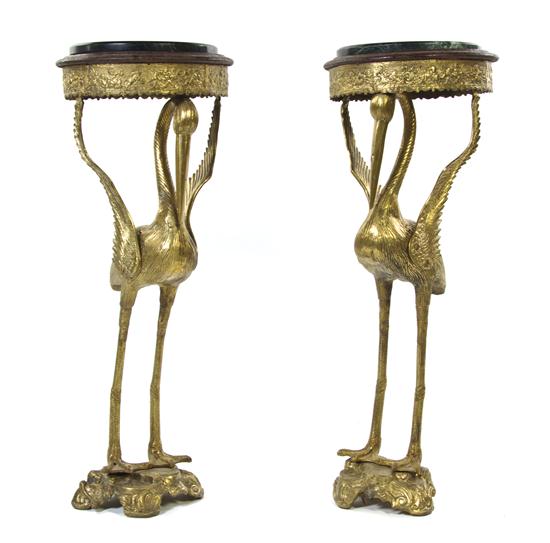 A Pair of Gilt Brass Figural Pedestal