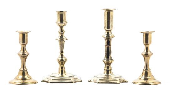 * A Pair of English Brass Candlesticks